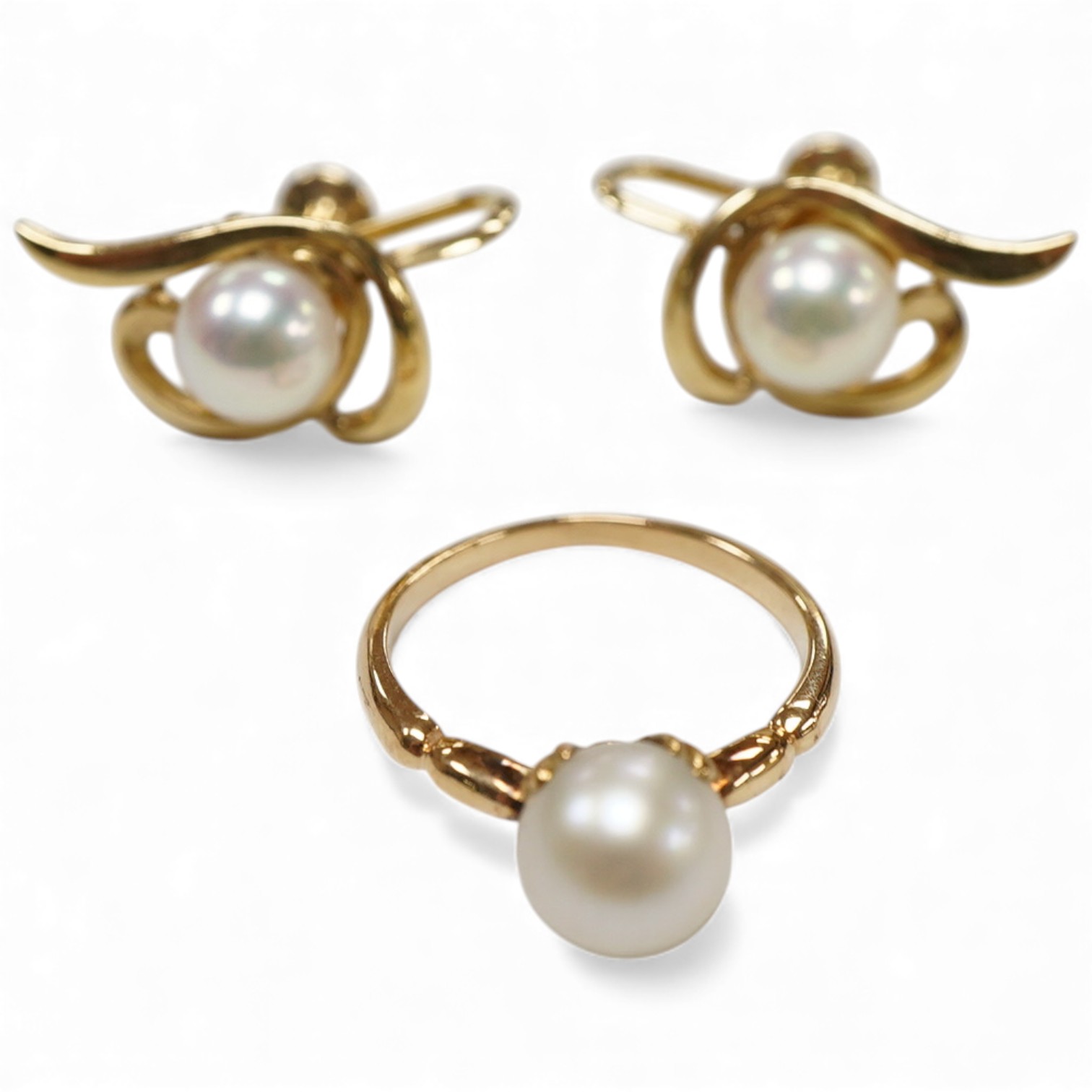 A pair of Mikimoto 14k yellow metal and single stone cultured pearl set ear clips, 17mm, together with a 14k yellow metal and single stone cultured pearl set ring.
